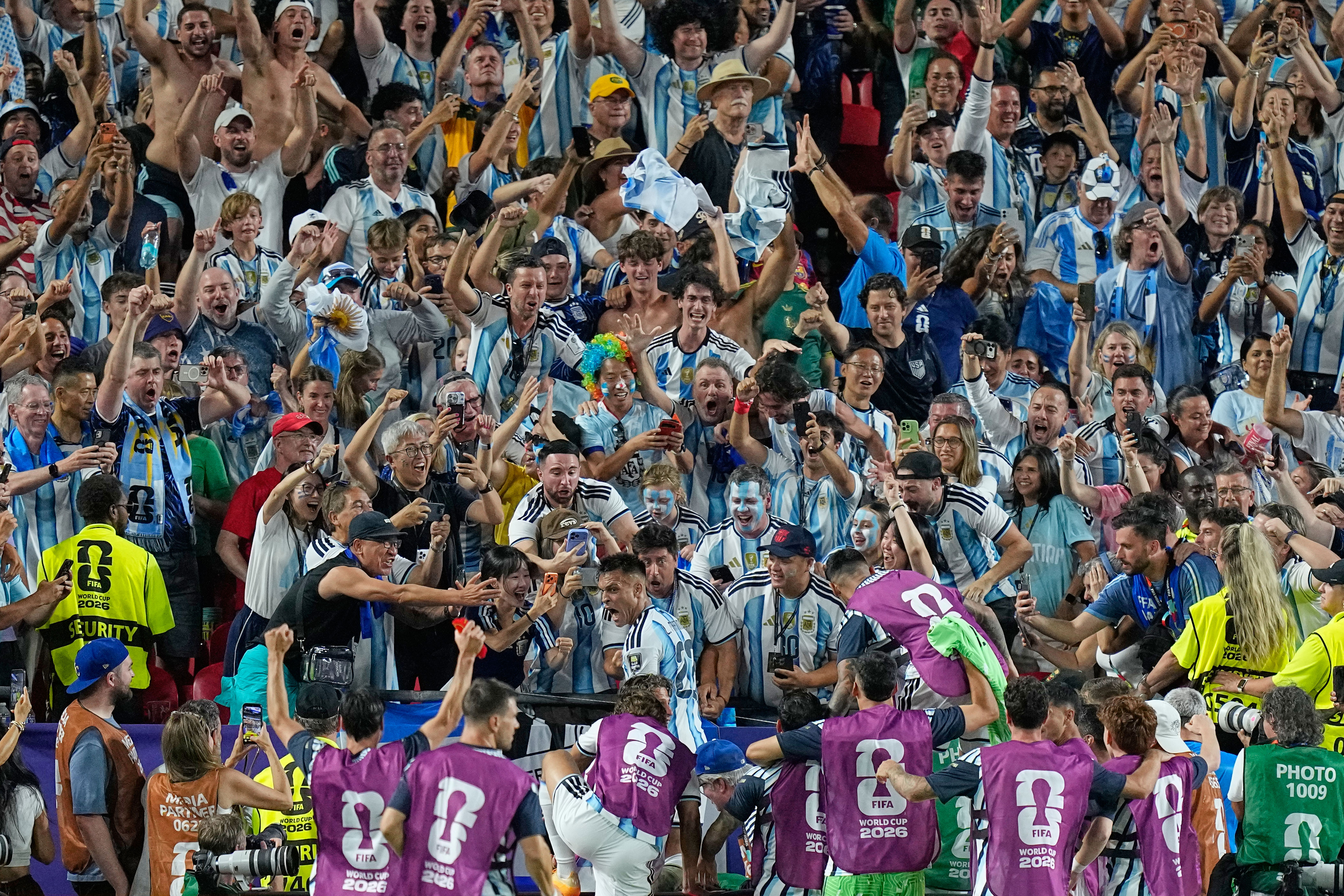 One extraordinary photo: Argentina's Lautaro Martinez in the stands celebrating his goal with fans