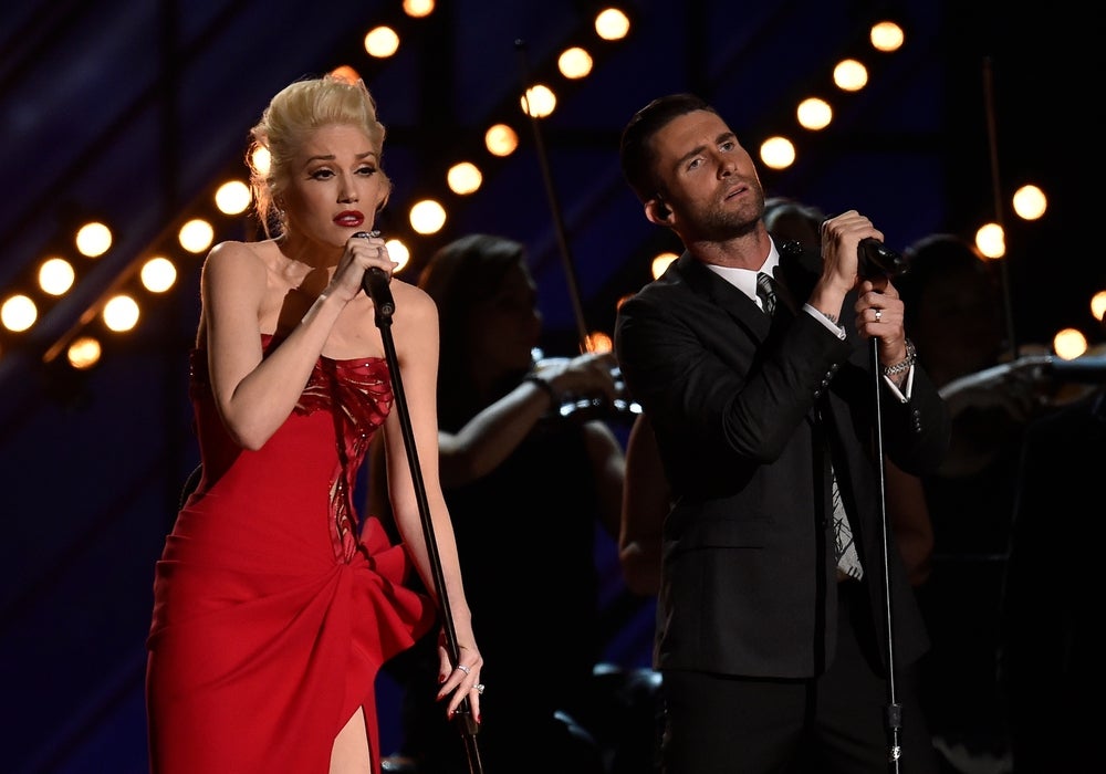 Feb 8, 2015; Los Angeles, CA, USA; Gwen Stefani and Adam Levine perform \