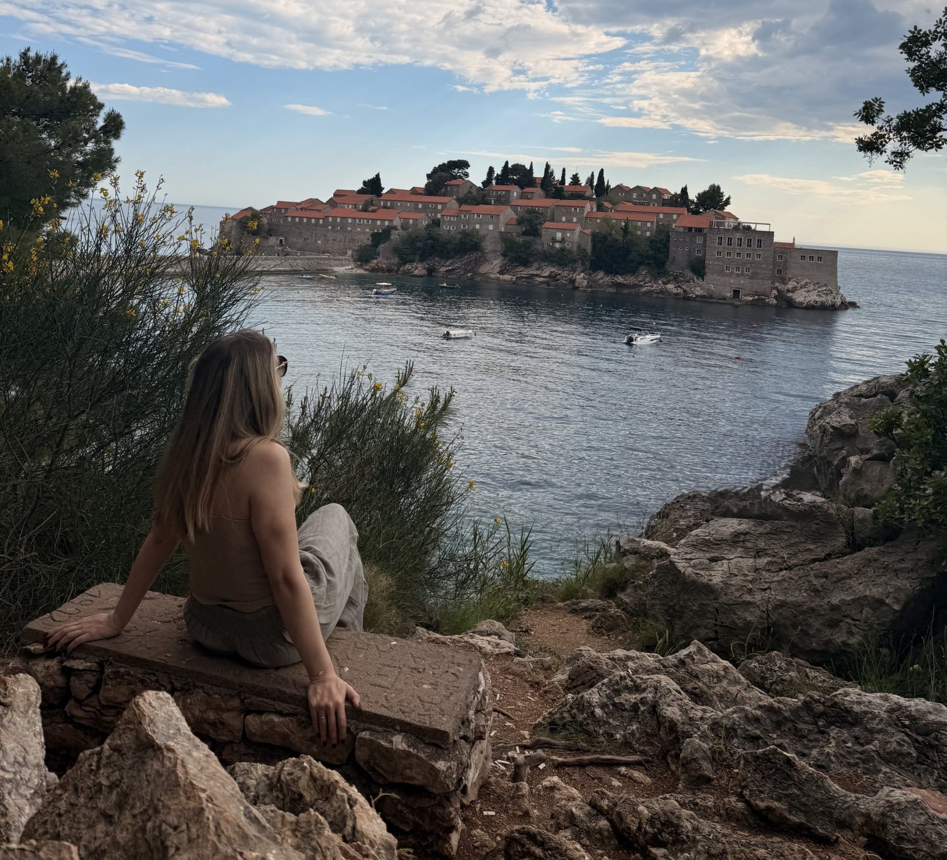 Alice Giddings looking out over the water to Sveti Stefan