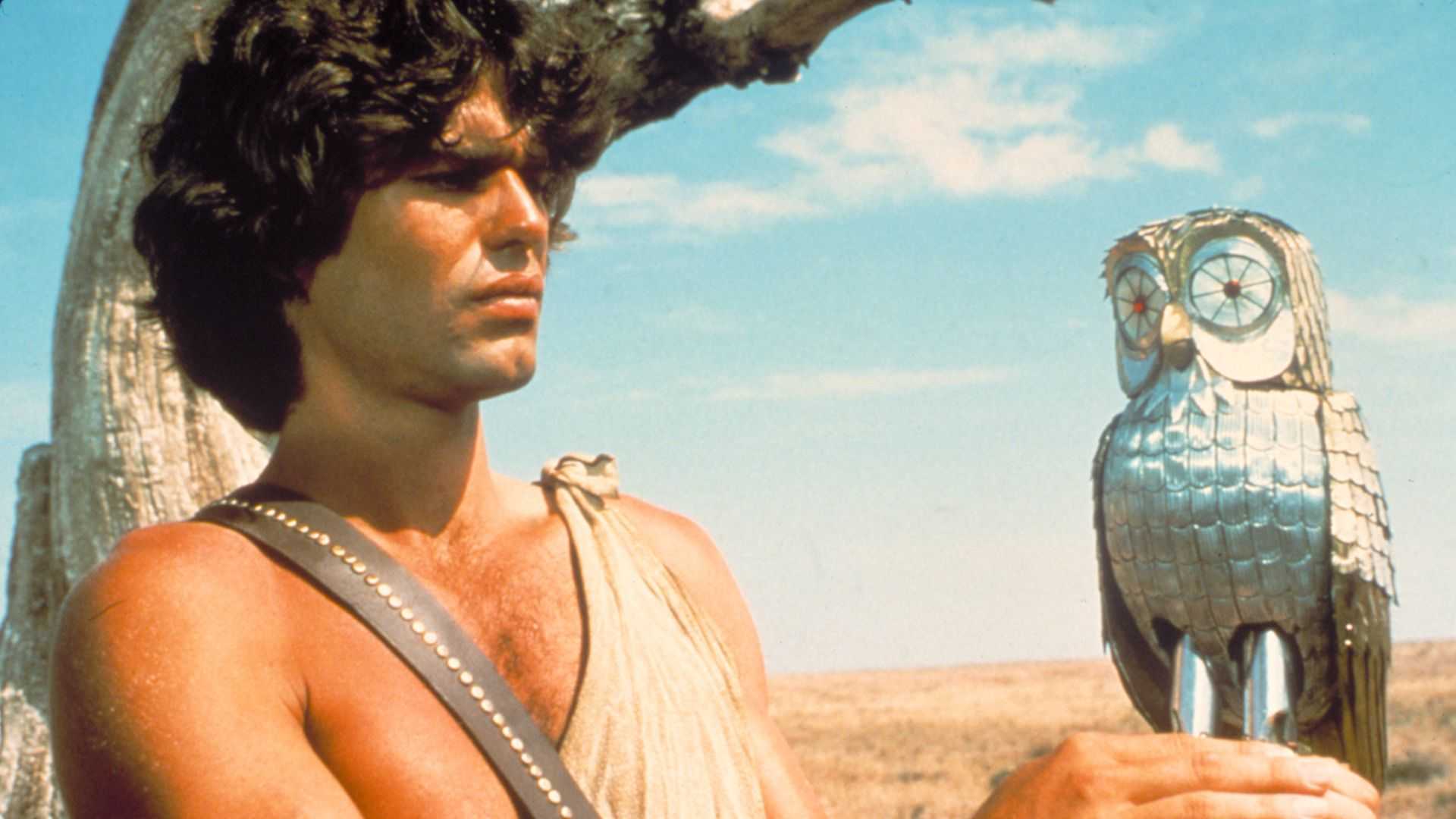 Perseus (Harry Hamlin) holding up the owl Bubo in Clash of the Titans.