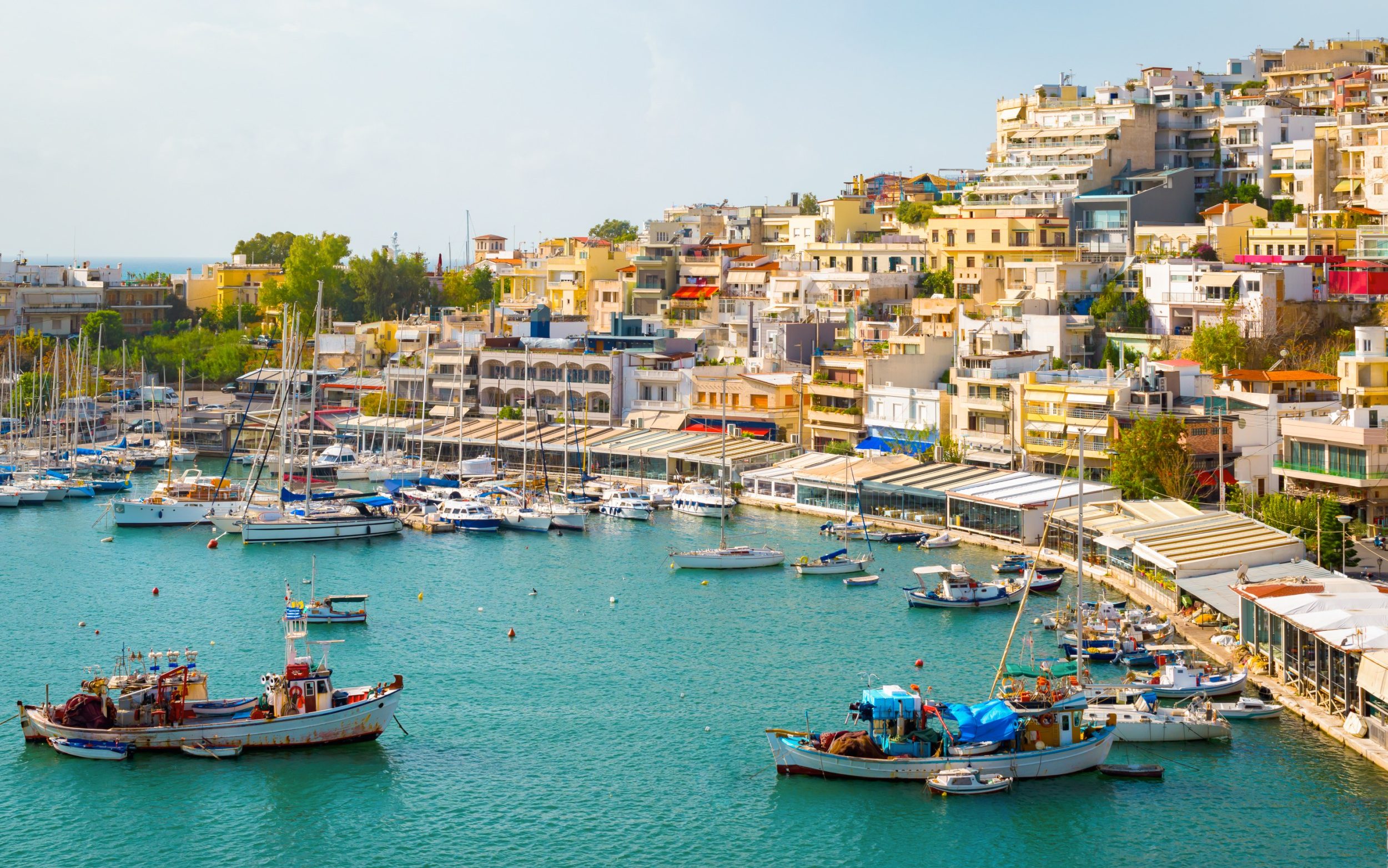 Mikrolimano, fishing port with colorful buildings and restaurants. Athens, Greece - Piraeus, Mikrolimano harbor.