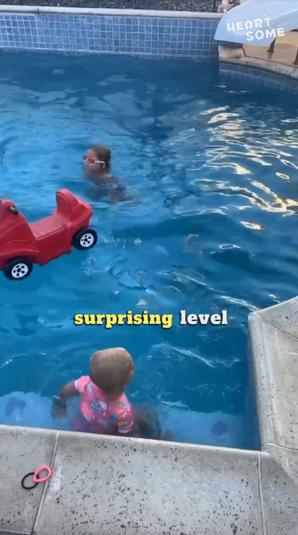 The toddler’s reaction to his toy car splashing into the pool is priceless
