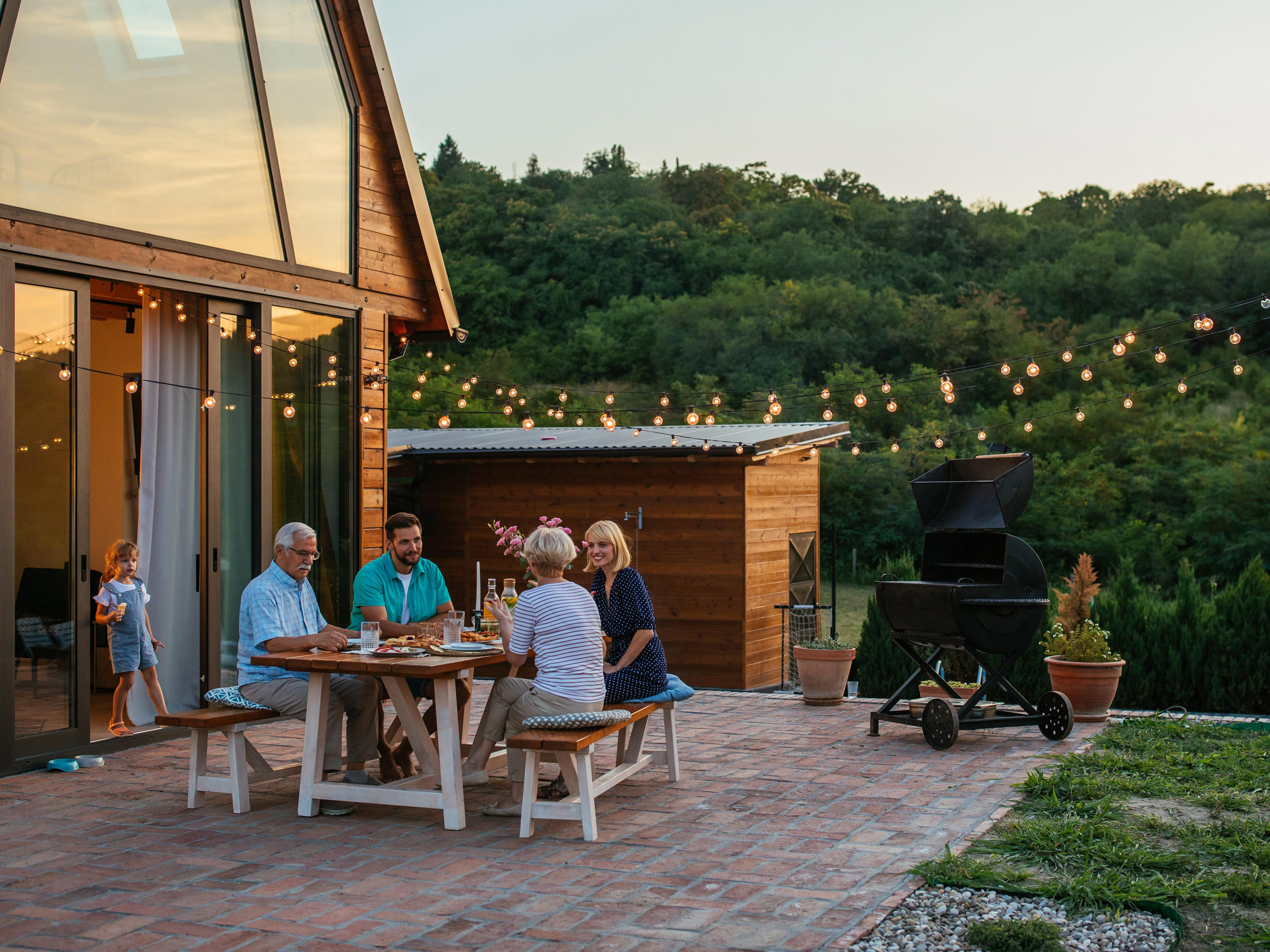 Family eating dinner outside