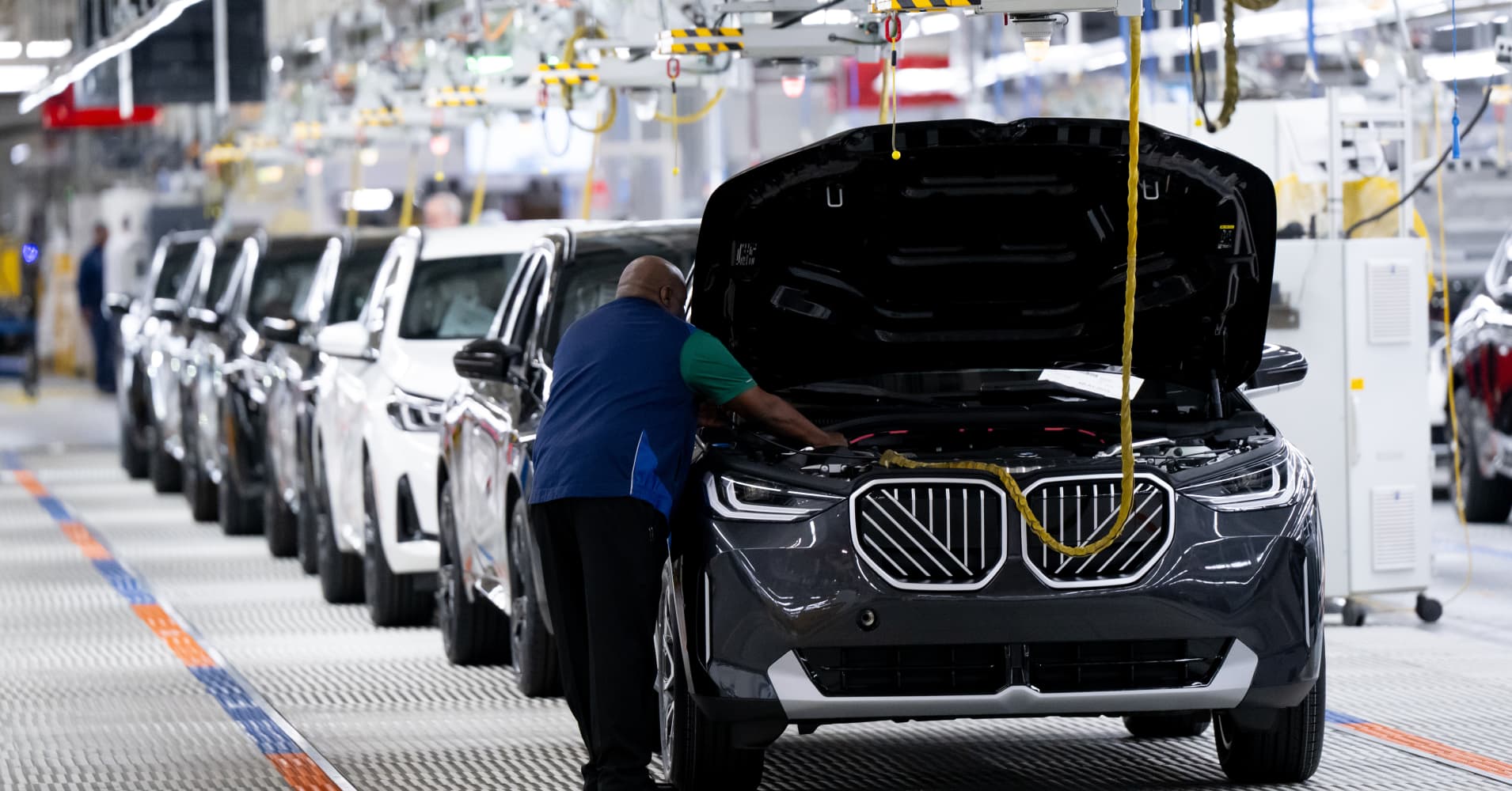 Various BMW models are on display in a factory hall at the BMW plant in Spartanburg, South Carolina.