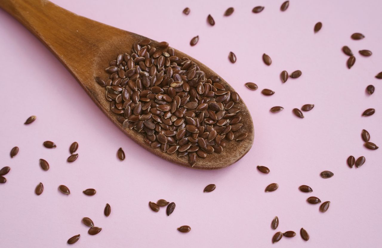 Wooden spoon of flaxseeds