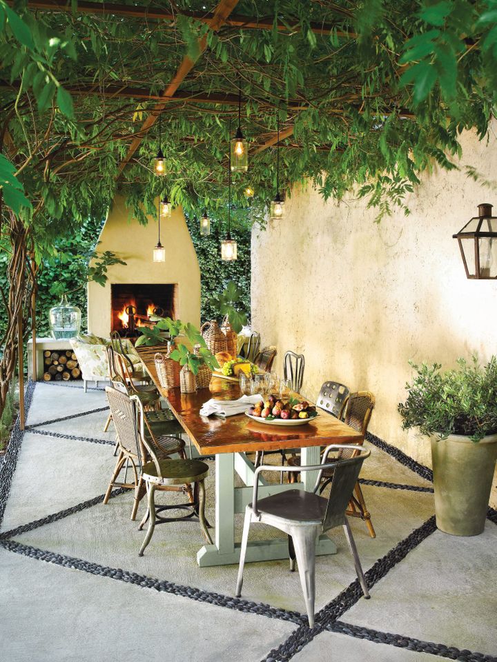 Iron and Greenery Pergola with Iron Dining Chairs