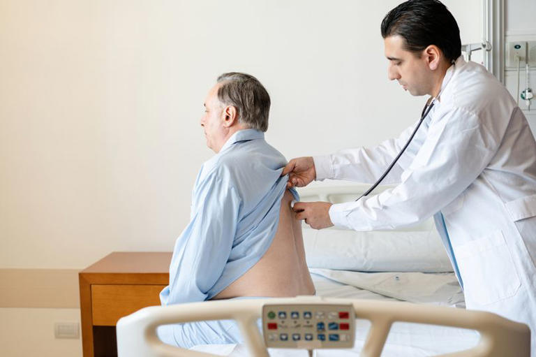 Man being checked by doctor
