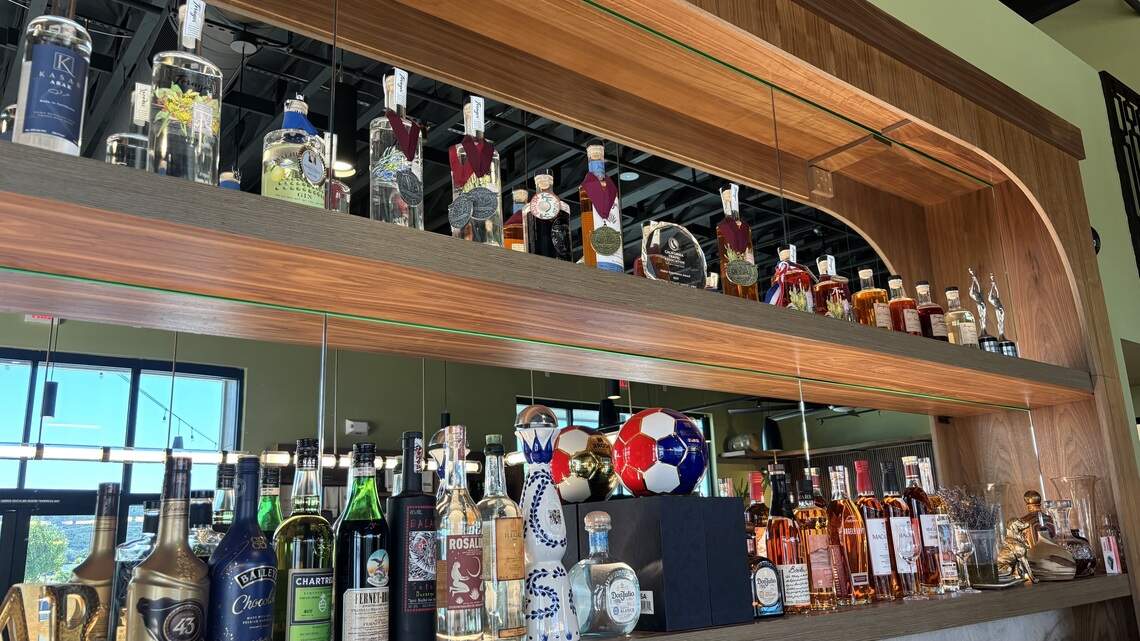 The top shelf at Central Coast Distillery in Atascadero features the distillery’s spirits, including gin, whiskey bourbon and vodka, seen here on July 2, 2026.