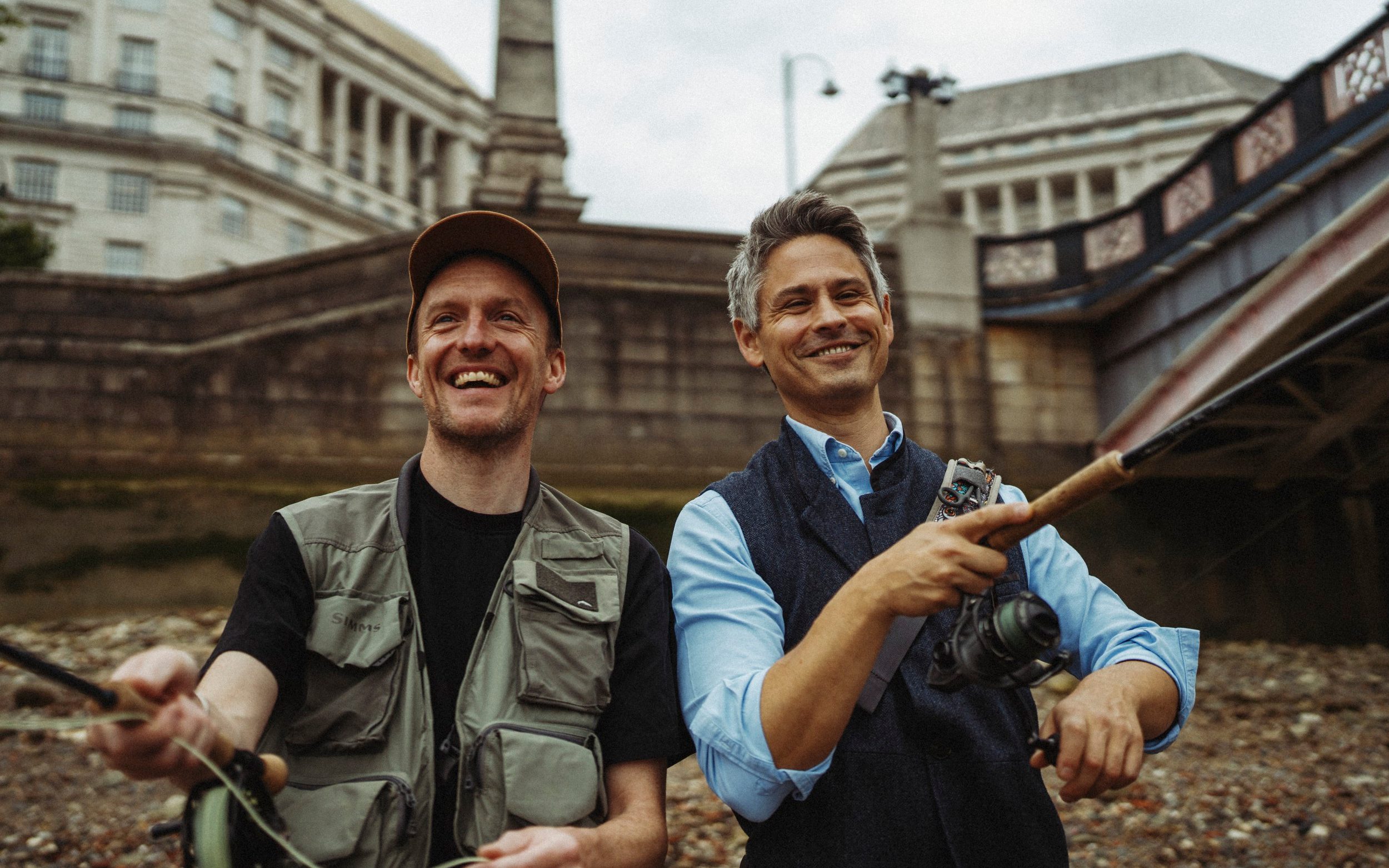 Joe Shute and Andrej Urosevic fishing from the shore of the Thames