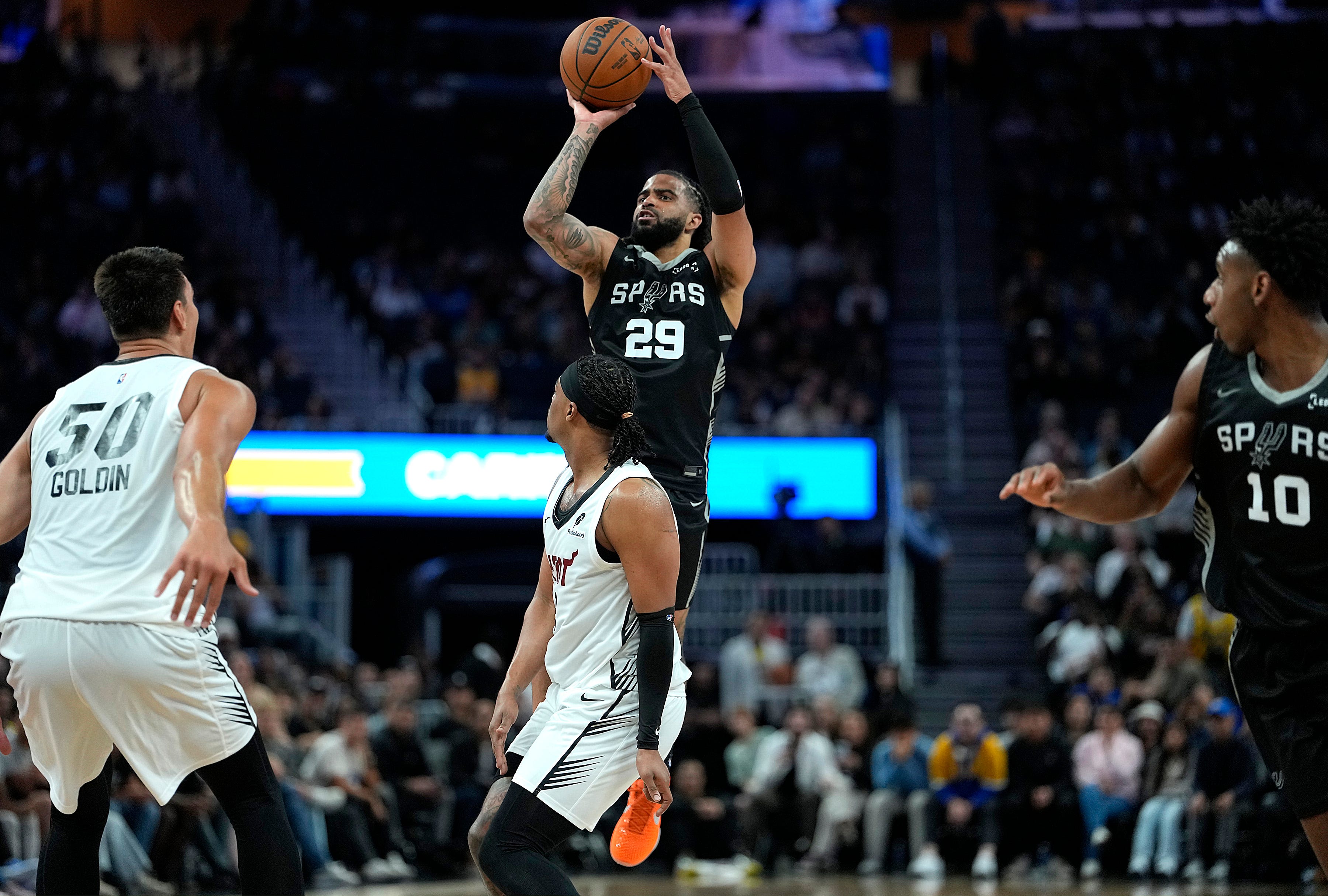 SAN FRANCISCO, CALIFORNIA - JULY 03: RJ Davis #29 of the San Antonio Spurs shoots a three-point shot over Trevor Keels #8 of the Miami Heat during the second half in the California Classic a NBA Summer League game at Chase Center on July 03, 2026 in San Francisco, California. NOTE TO USER: User expressly acknowledges and agrees that, by downloading and or using this photograph, User is consenting to the terms and conditions of the Getty Images License Agreement. (Photo by Thearon W. Henderson/Getty Images)