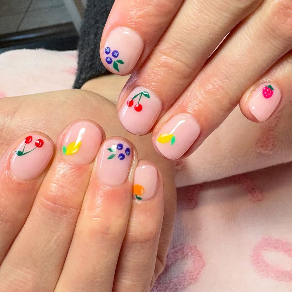 Nude nails with fruit designs