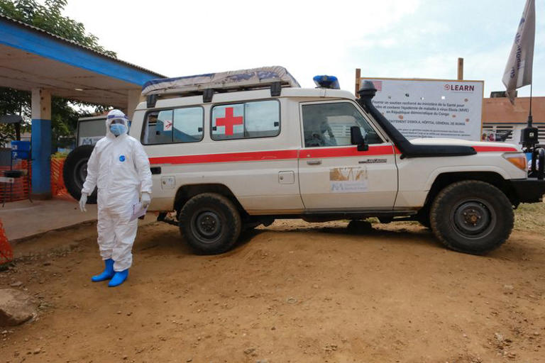 FILE PHOTO: A doctor wearing personal protective equipment (PPE) stands near an ambulance at the Ebola Virus Disease Treatment Center at the Bunia General Reference Hospital in Bunia, eastern Democratic Republic of Congo, June 15, 2026. REUTERS/Gradel Muyisa Mumbere/File Photo