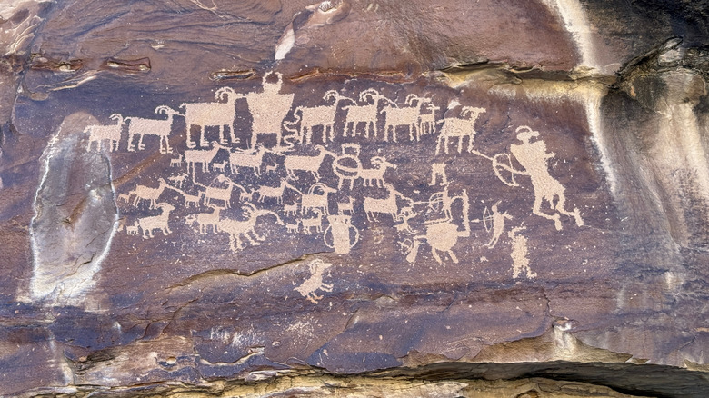Petroglyphs related to hunting on canyon walls at Nine Mile Canyon, Utah.