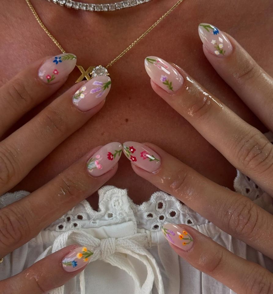 Nude nails with flower illustrations