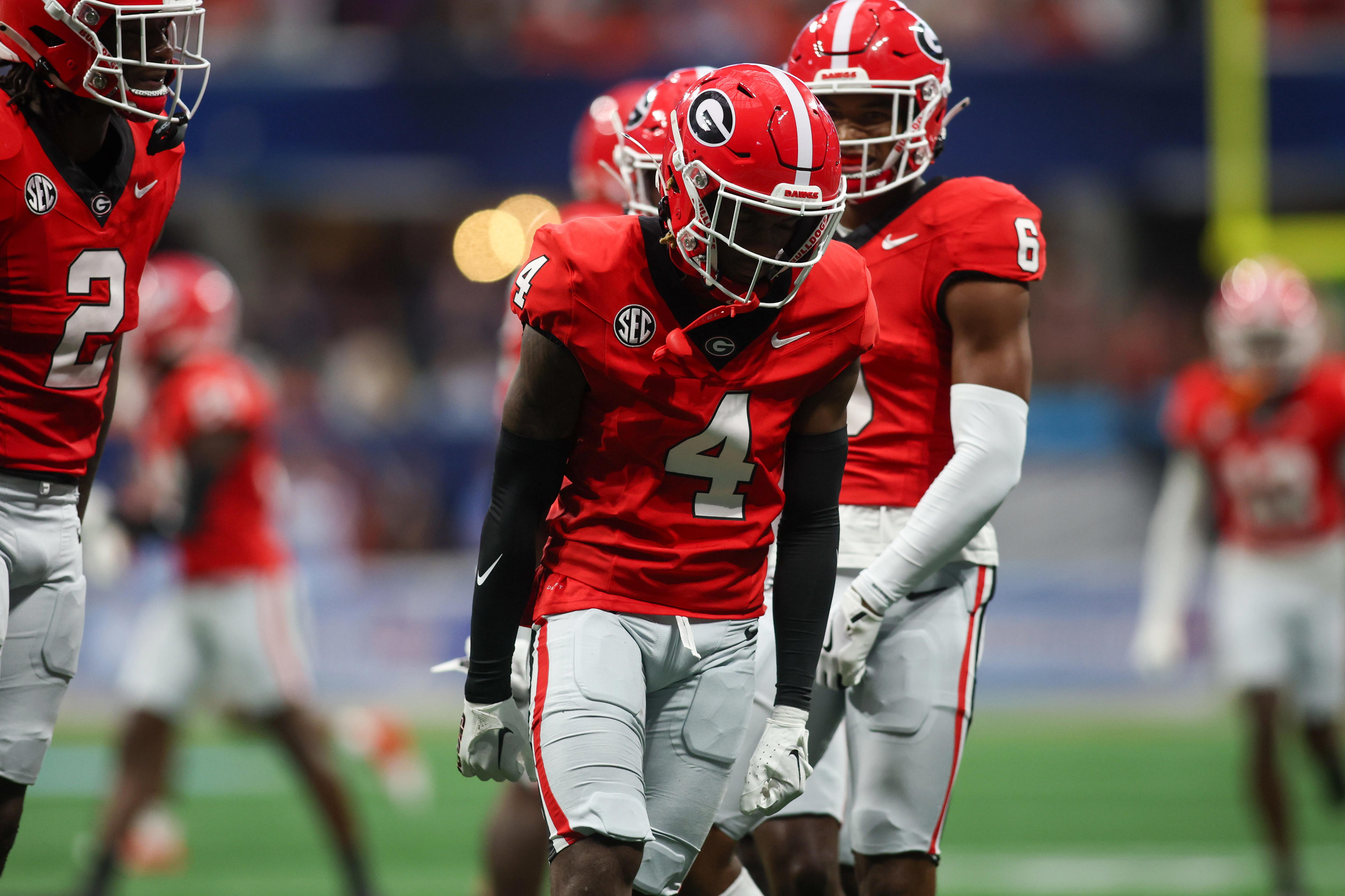 Georgia Bulldogs defensive back KJ Bolden (4) reacts after a tackle against the Clemson Tigers