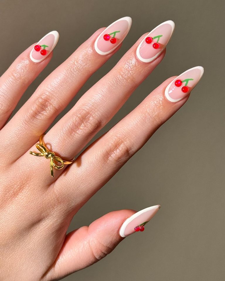 Nails with white outlines and cherries