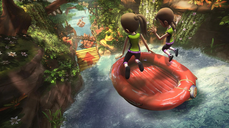 Two women ride a raft on a river through a jungle in Kinect Adventures!