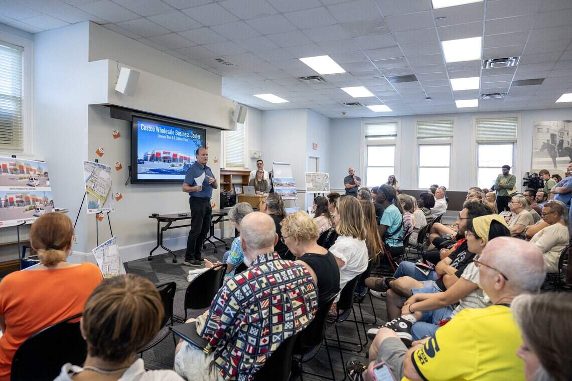 Steven Cross, speaks to community members about the proposed Costco Linwood Business Center zoning changes during a public meeting at the Westport Library Tuesday, July 7, 2026, in Kansas City.