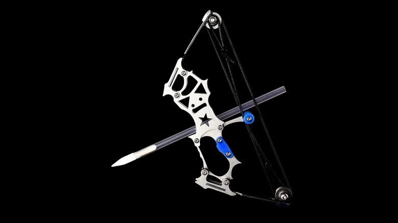 Stock photo of a mini bow and arrow on a black background