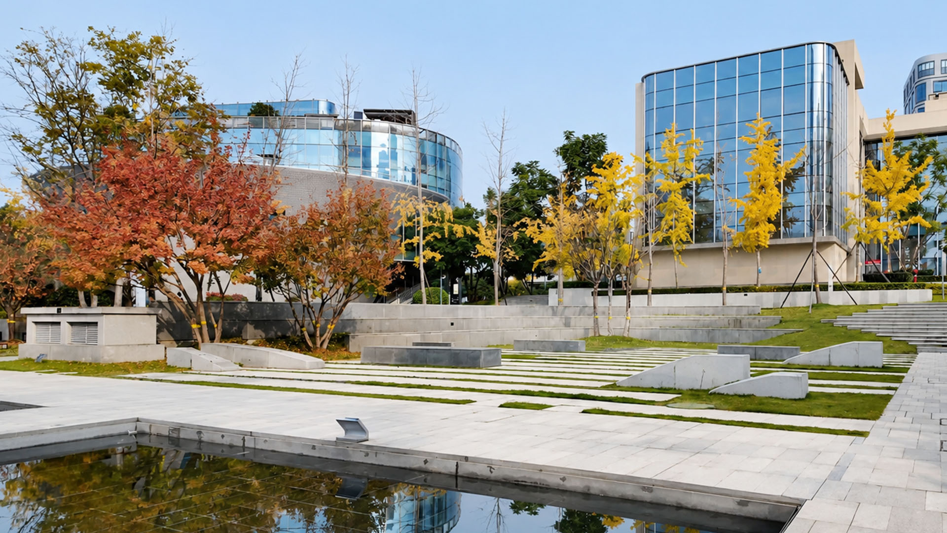 Seasonal trees frame contemporary architecture across this well planned ...