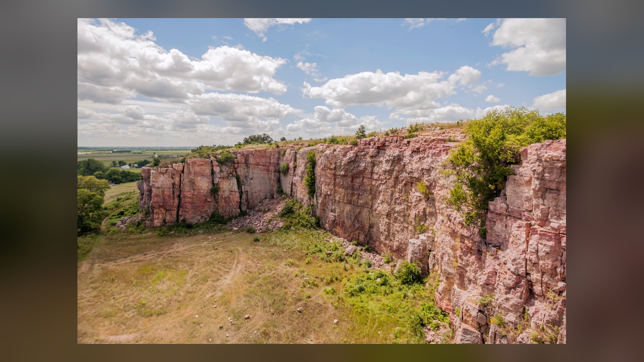 Pink quartzite cliffs, free-roaming bison, and prickly pear? This is ...