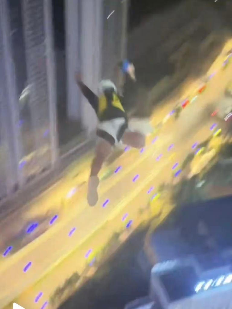 Man permanently banned from social media after rooftop parachute stunt in China
