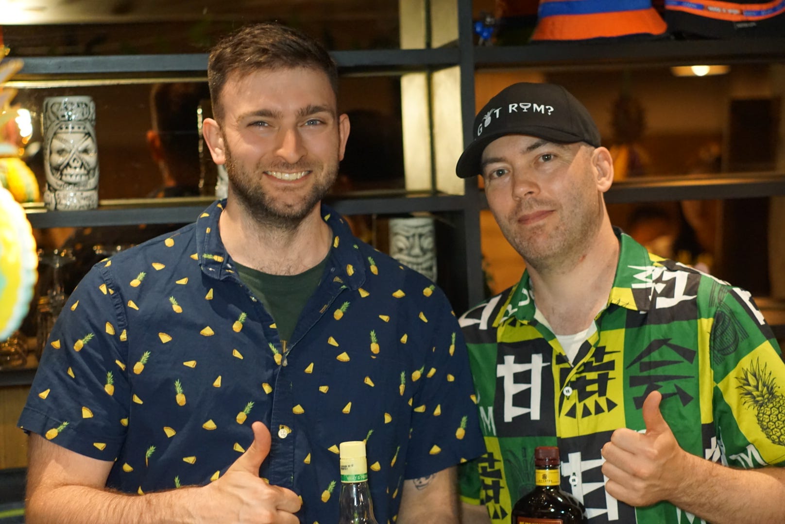 Two men at a bar in China.