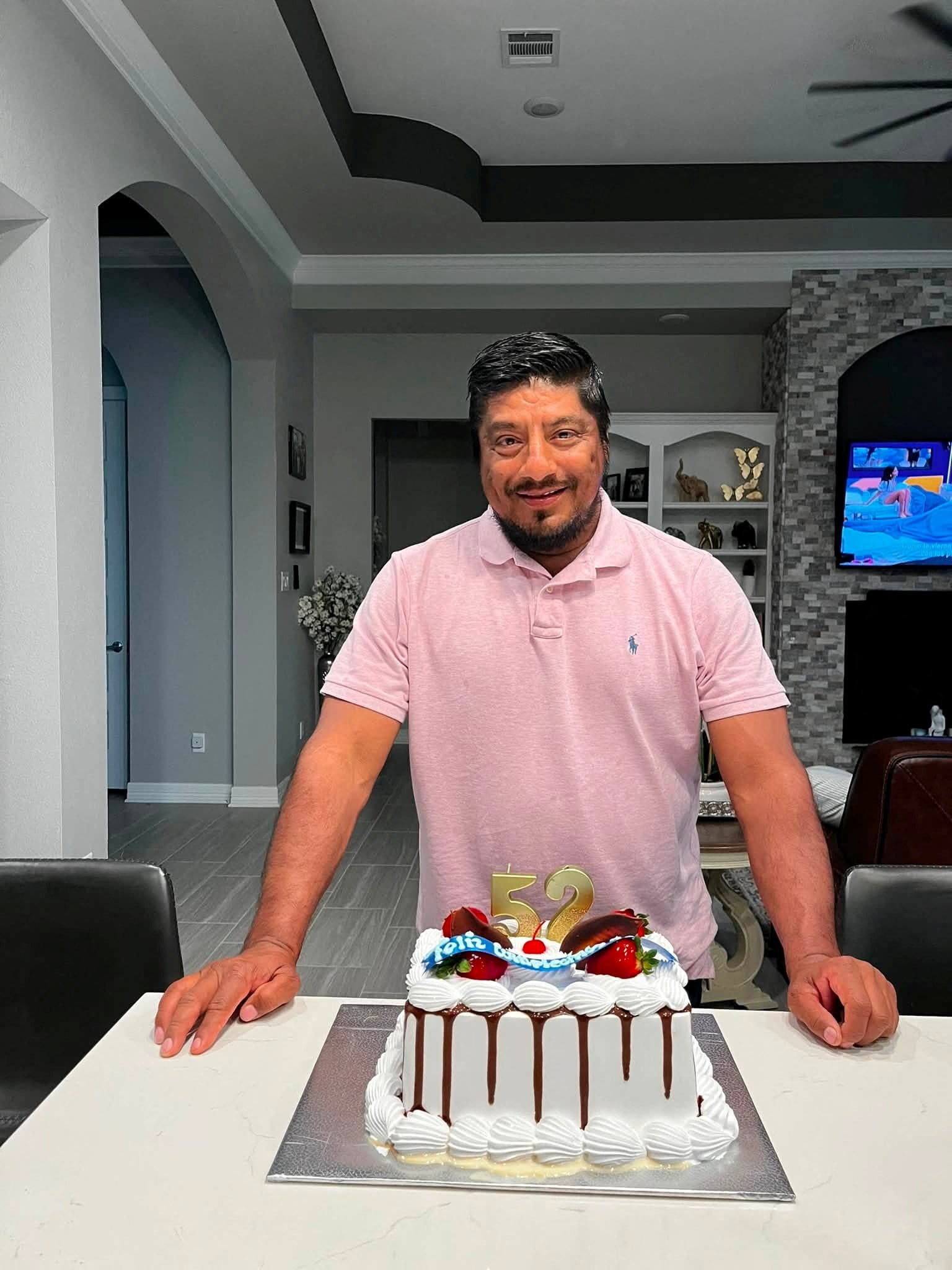 Lorenzo Salgado Araujo, the motorist shot to death by an ICE agent during a vehicle stop in Houston, pictured celebrating his birthday with this family earlier this year. / RONALDO SALGADO / RONALDO SALGADO via REUTERS