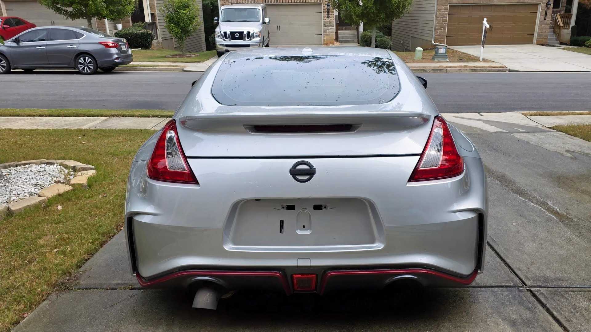 2016 Nissan 370Z Nismo rear shot parked in driveway