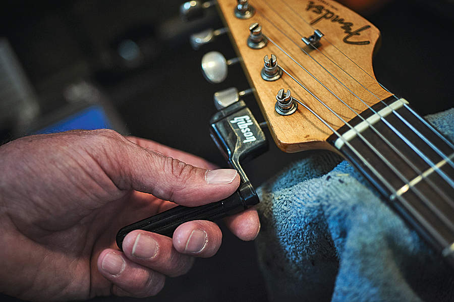 Restringing a guitar