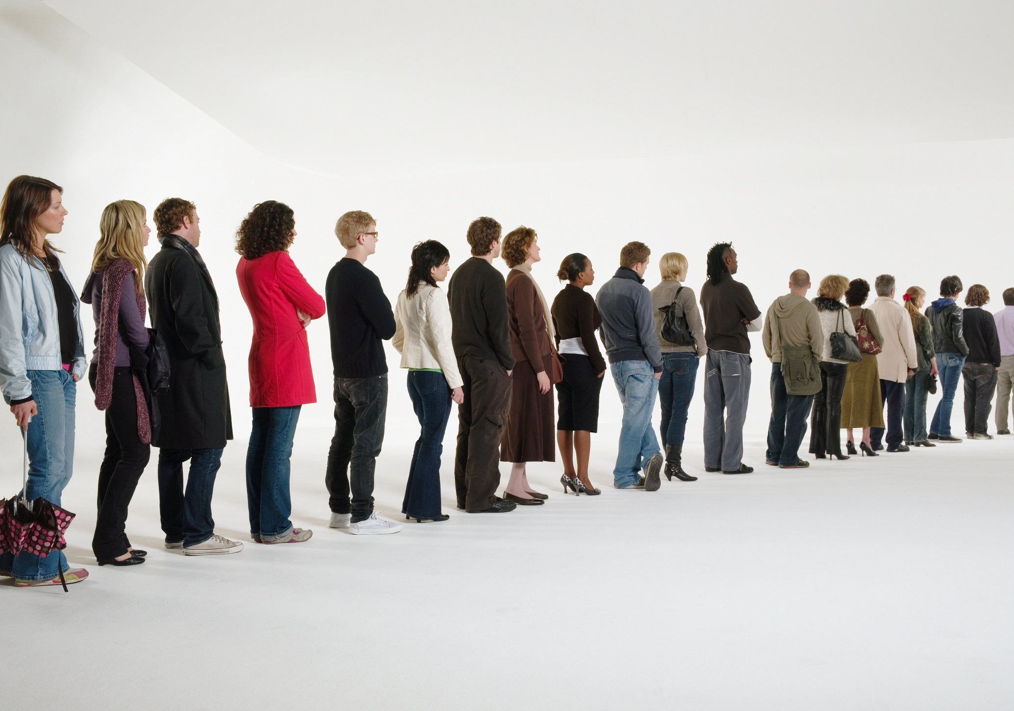 People standing in a single-file line, facing away, in a minimalistic setting