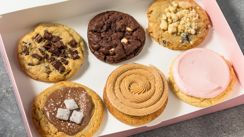 6 Crumbl cookie varieties inside pink Crumbl box