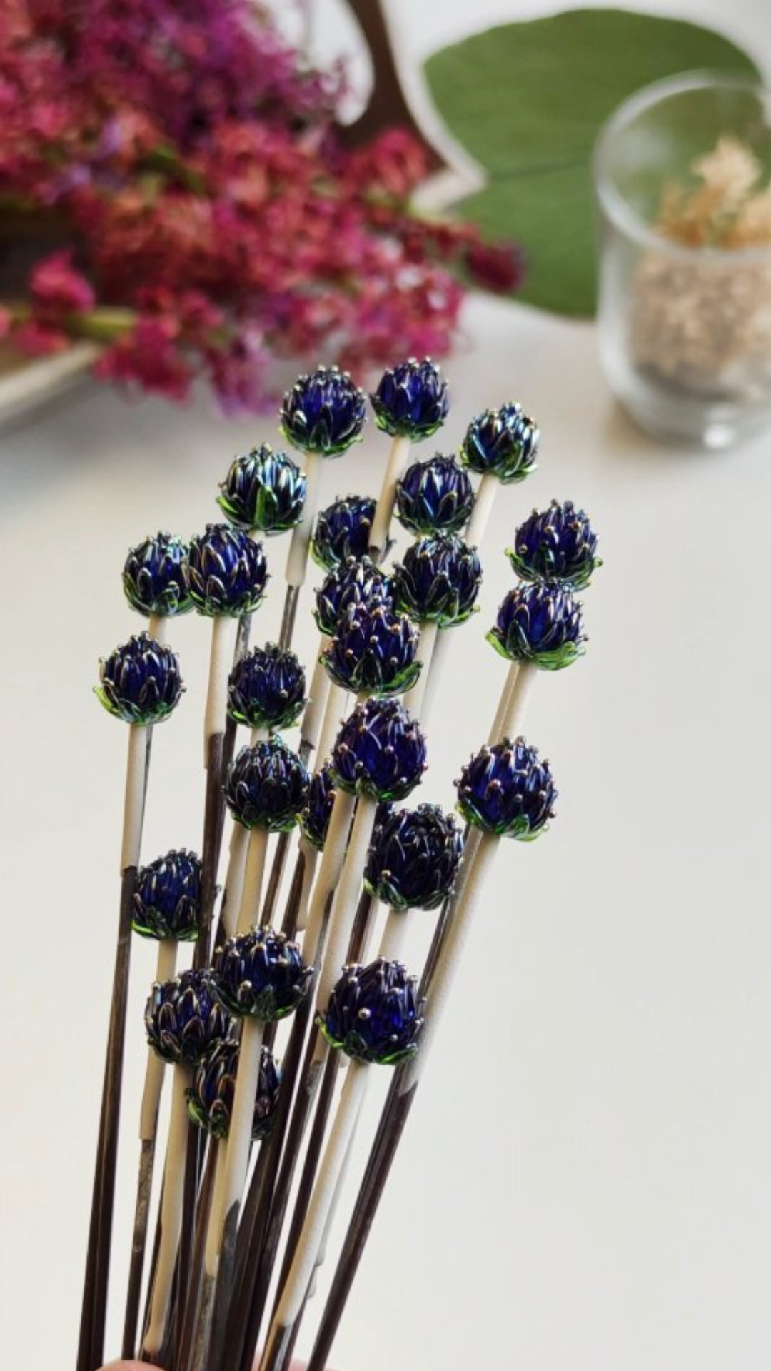 The secret process behind glass flower jewelry making