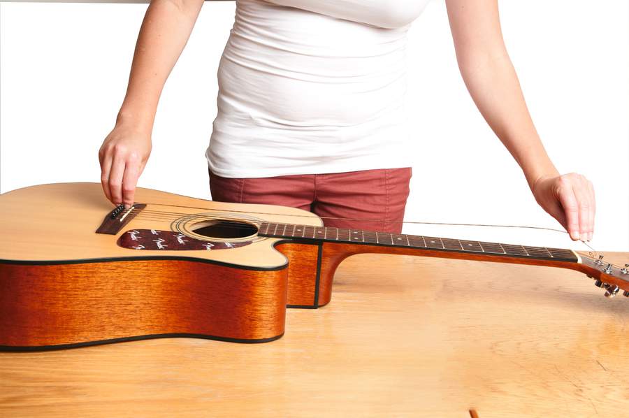 Restringing a guitar