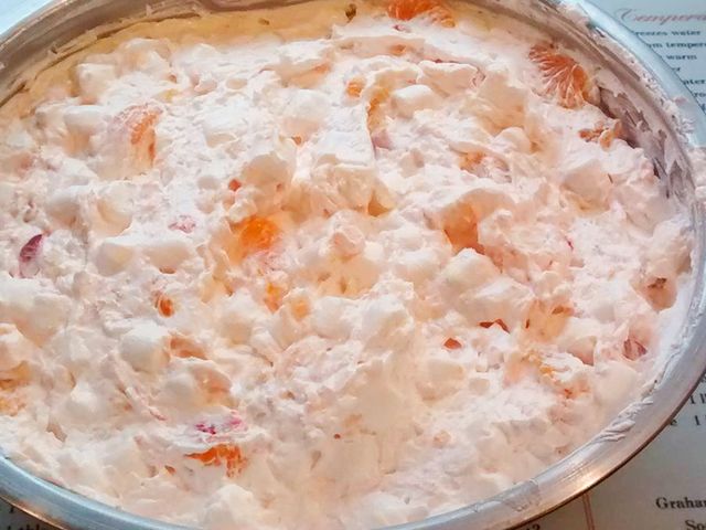 close up view of Mandarin Orange Watergate Salad in a metal bowl