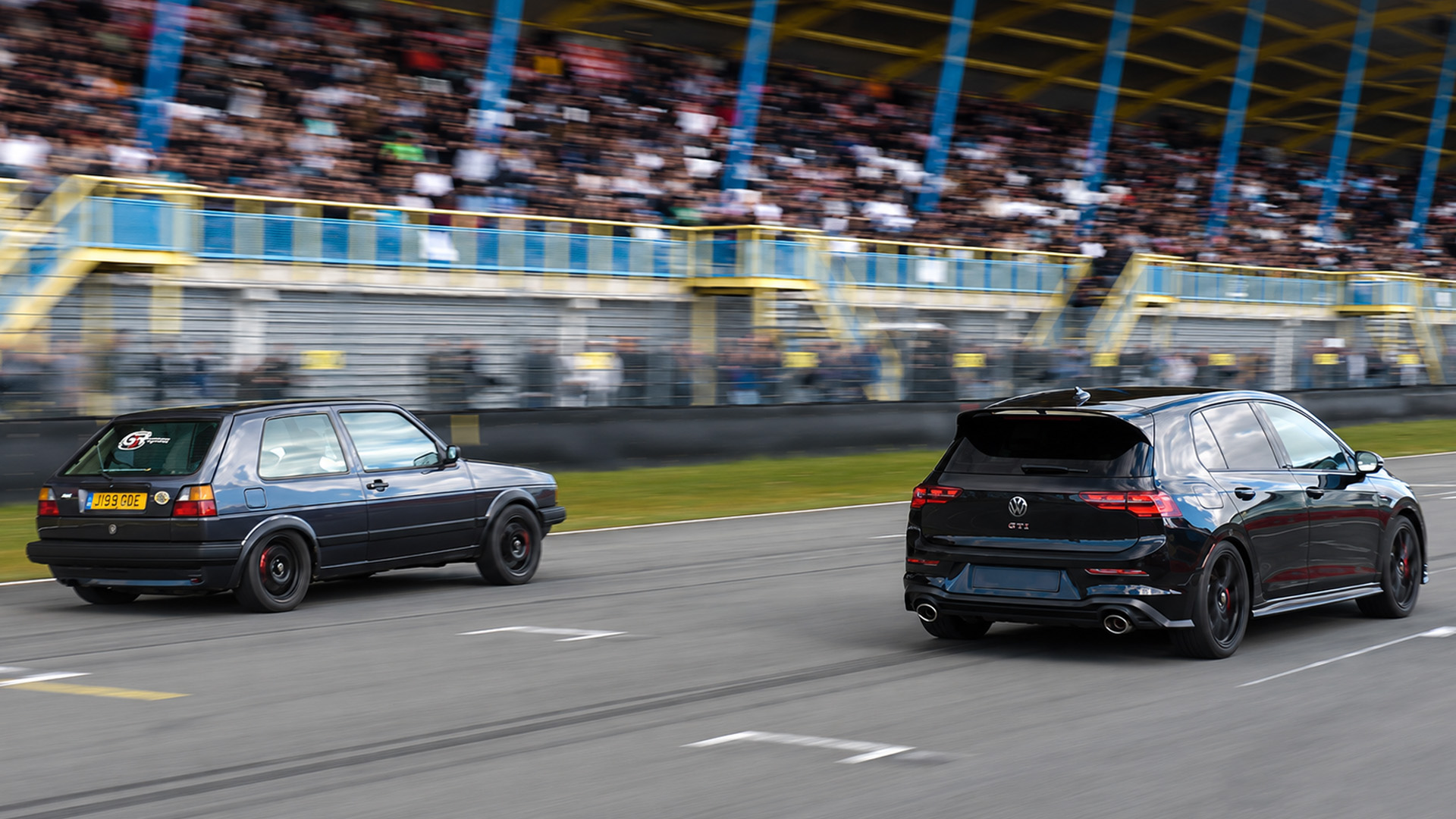 Old VW Golf battles new VW Golf GTI on strip