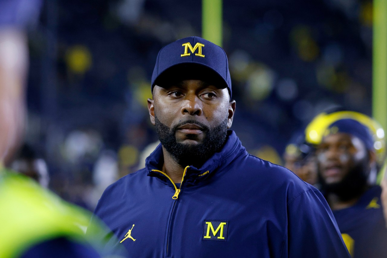 Michigan missed warning signs around football coach's affair, investigation finds
