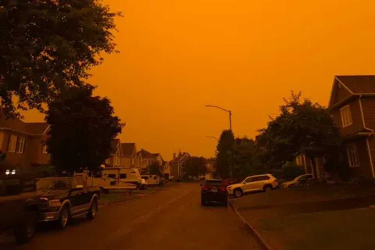 Photos: Blanket of wildfire smoke creates eerie skies across parts of ...