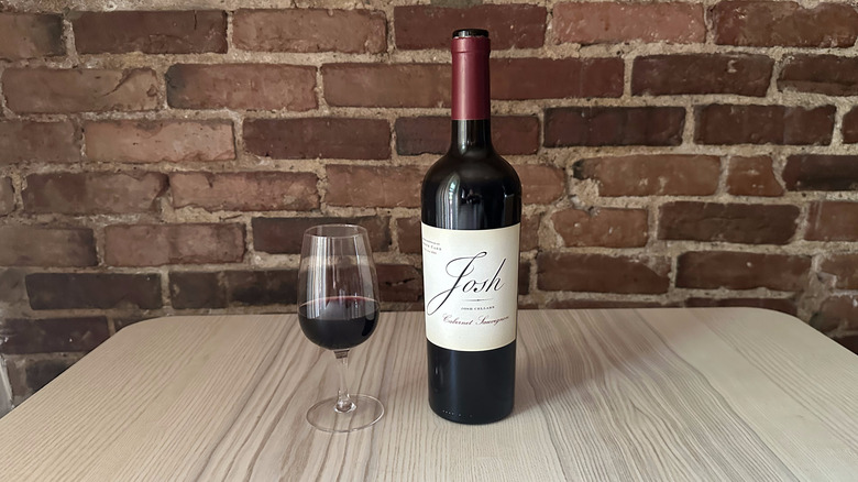 Bottle of Josh Cabernet Sauvignon on wooden table