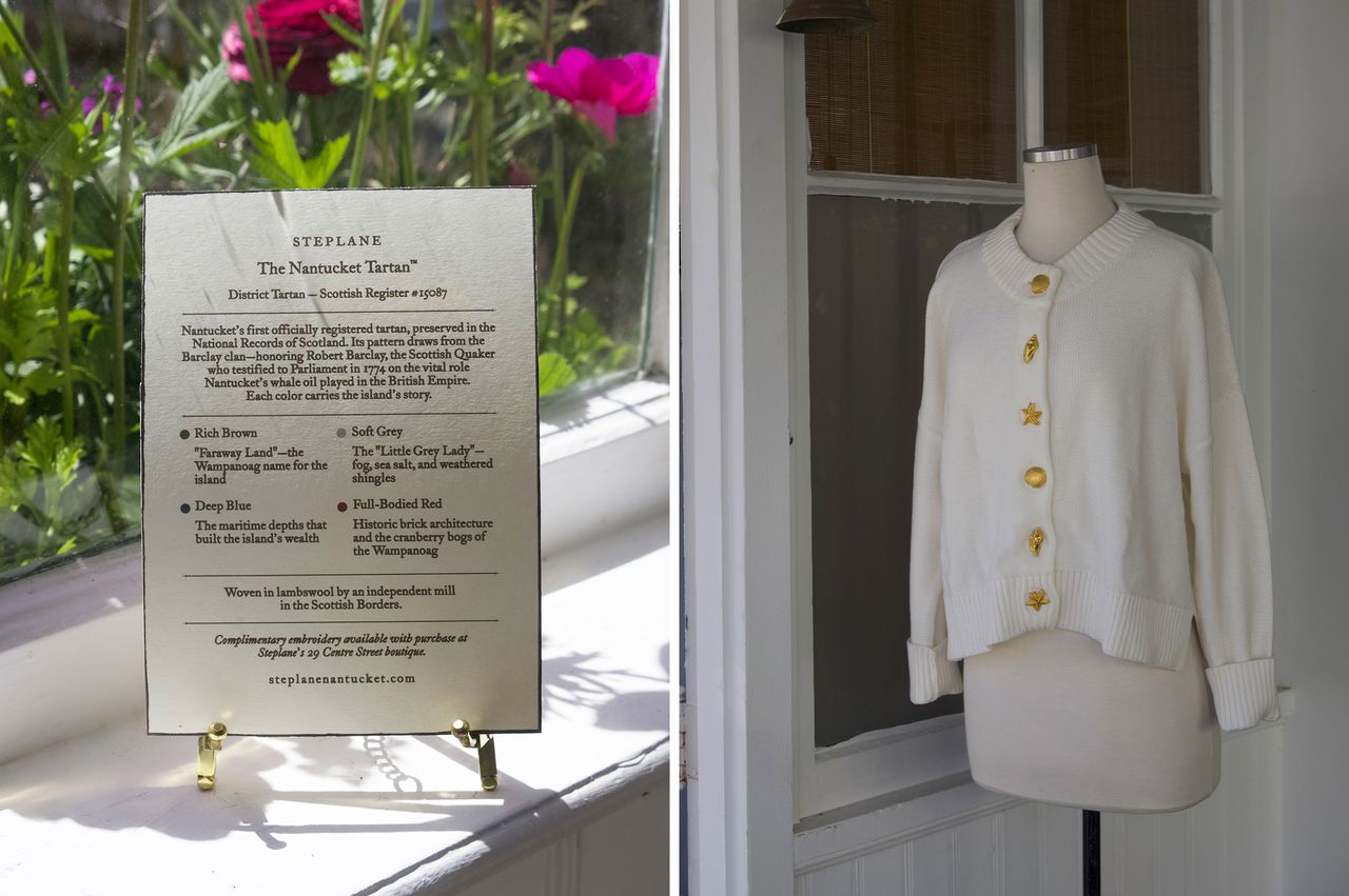 A display sign describing a project and a white cardigan on a mannequin in a shop