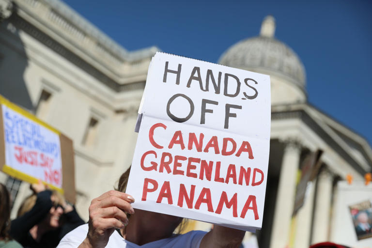 Trump makes new threats to Canada and Greenland with provocative photo