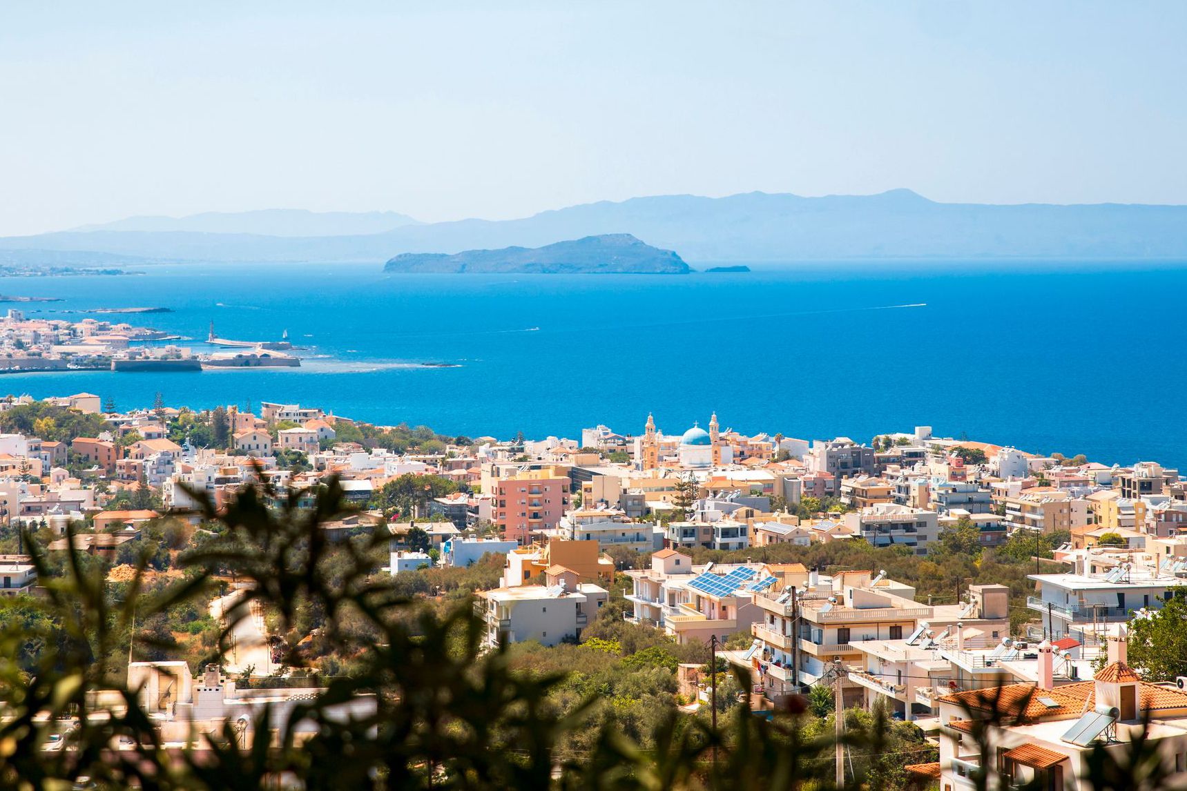 Colorful rooftops along Crete's coast
