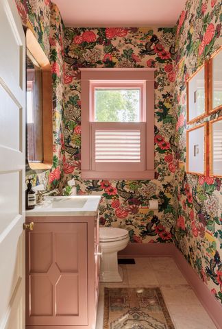 Pink ceiling in a wallpapered powder rom