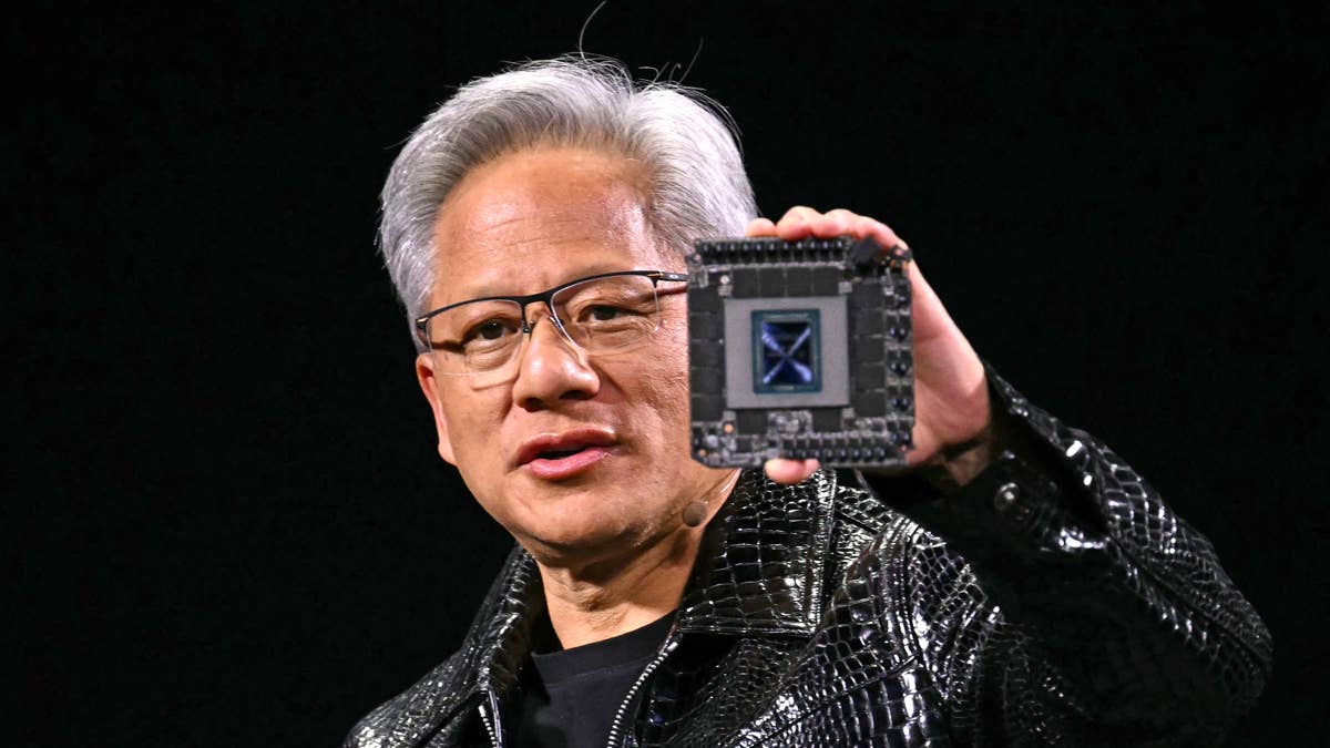 nvidia-ceo-jensen-huang-speaks-during-an-event-holding-a-product