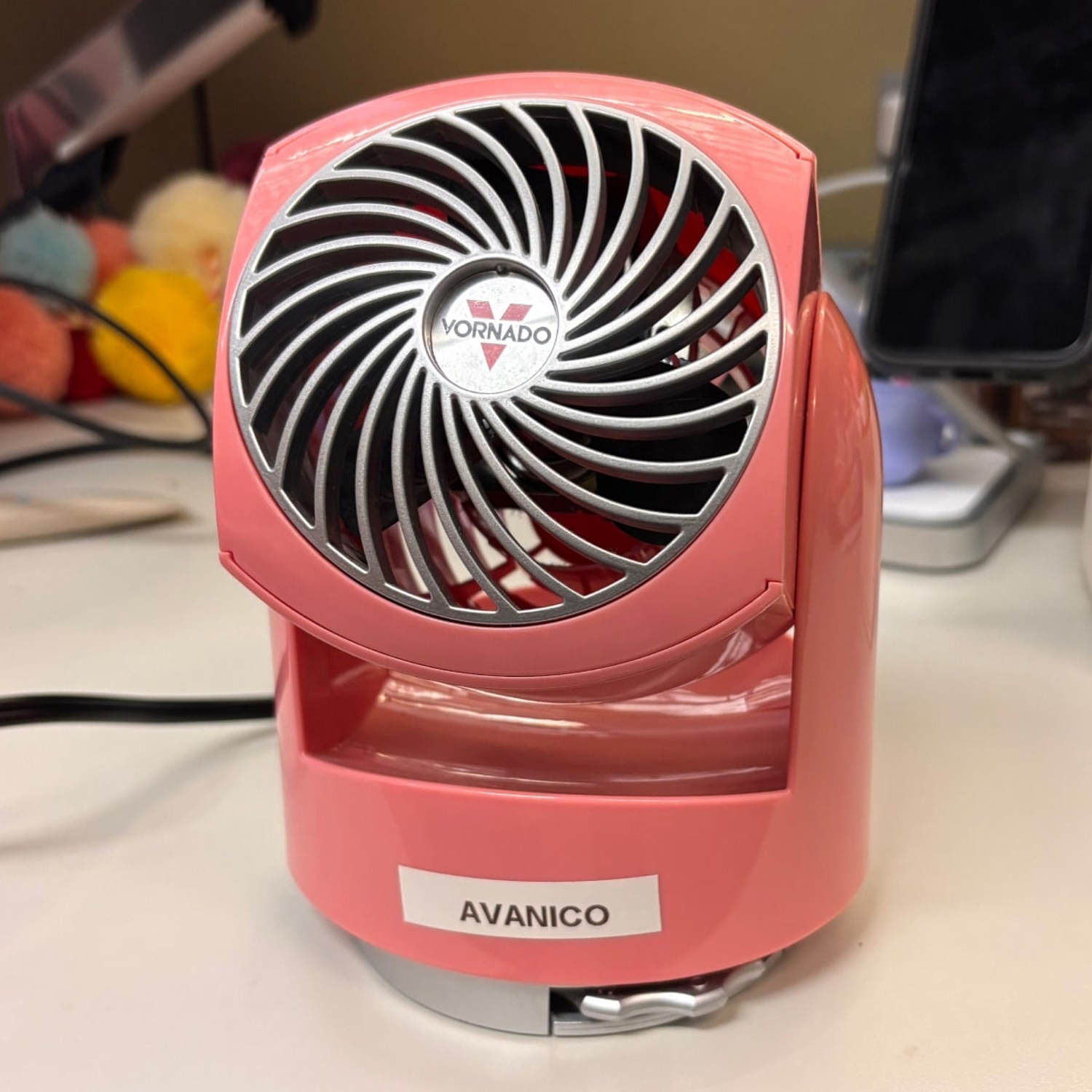 Vornado desk fan sitting on a desk (Courtesy Cory Fernandez)