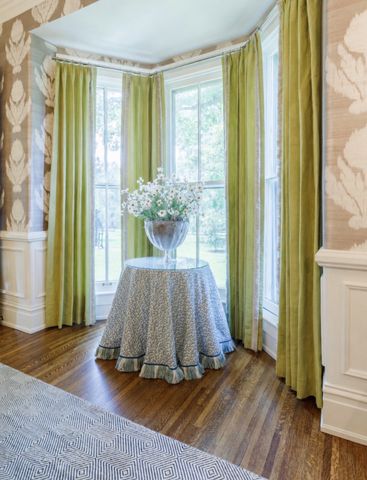 Light blue ceiling with chartreuse drapery