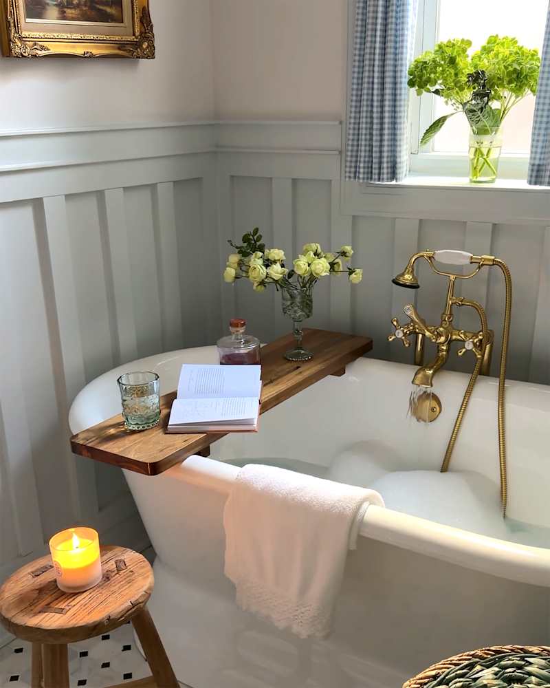 Newly installed bathtub in renovated bathroom.