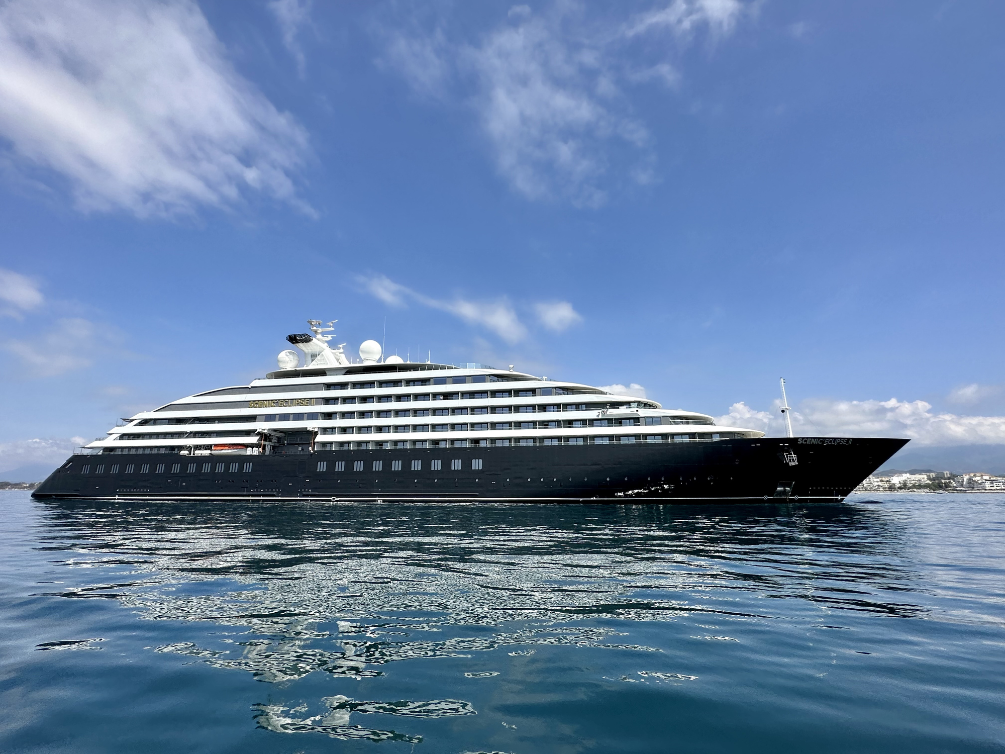 Scenic Eclipse 2, a luxury ocean cruising yacht moored outside the harbour at Puerto Banus in Spain