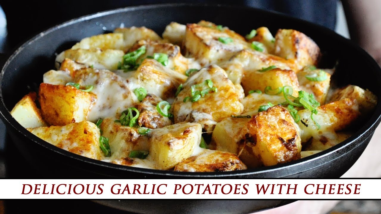Crispy garlic roasted potatoes with melted cheese