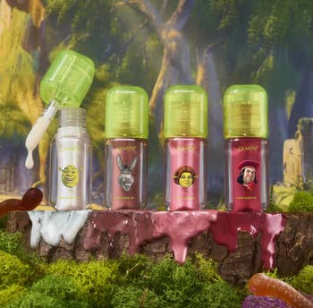 Four lip glosses featuring